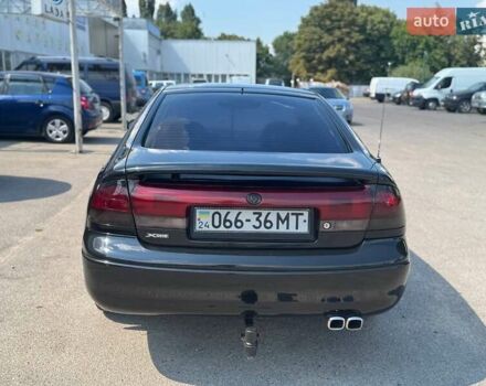 Чорний Мазда 626, об'ємом двигуна 1.8 л та пробігом 310 тис. км за 3300 $, фото 14 на Automoto.ua