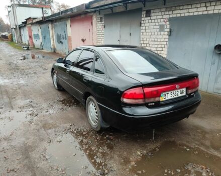 Черный Мазда 626, объемом двигателя 2 л и пробегом 573 тыс. км за 1100 $, фото 3 на Automoto.ua