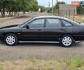 Черный Мазда 626, объемом двигателя 2.5 л и пробегом 190 тыс. км за 2800 $, фото 3 на Automoto.ua