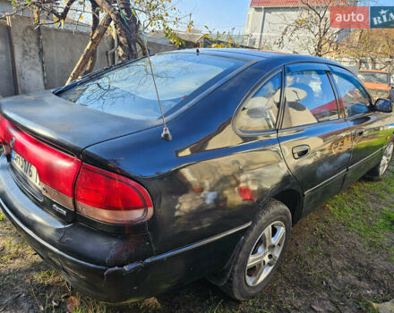 Чорний Мазда 626, об'ємом двигуна 1.99 л та пробігом 350 тис. км за 1500 $, фото 1 на Automoto.ua