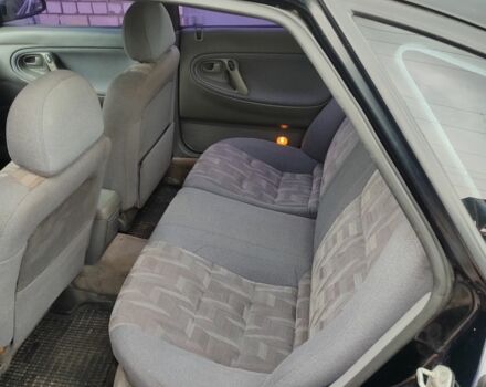 Черный Мазда 626, объемом двигателя 2 л и пробегом 573 тыс. км за 1100 $, фото 5 на Automoto.ua