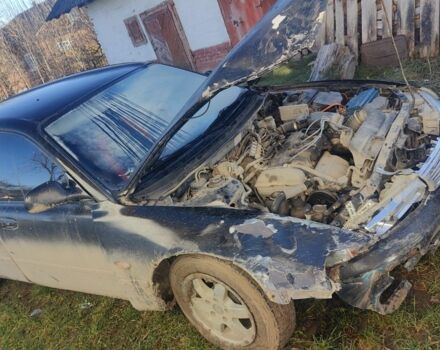 Черный Мазда 626, объемом двигателя 2 л и пробегом 480 тыс. км за 750 $, фото 2 на Automoto.ua