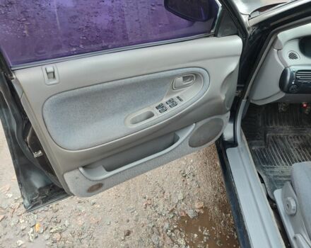 Черный Мазда 626, объемом двигателя 2 л и пробегом 573 тыс. км за 1100 $, фото 7 на Automoto.ua