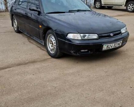 Черный Мазда 626, объемом двигателя 2.5 л и пробегом 380 тыс. км за 1500 $, фото 9 на Automoto.ua