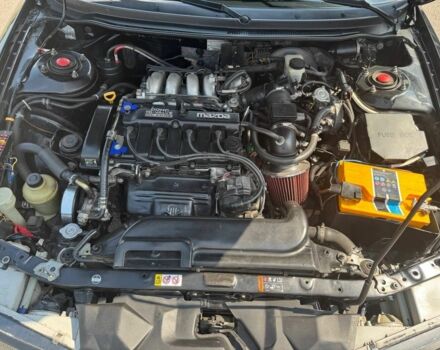 Черный Мазда 626, объемом двигателя 1.8 л и пробегом 310 тыс. км за 3000 $, фото 5 на Automoto.ua