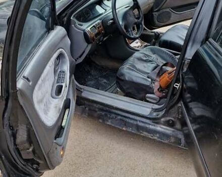 Черный Мазда 626, объемом двигателя 2.5 л и пробегом 380 тыс. км за 1500 $, фото 4 на Automoto.ua