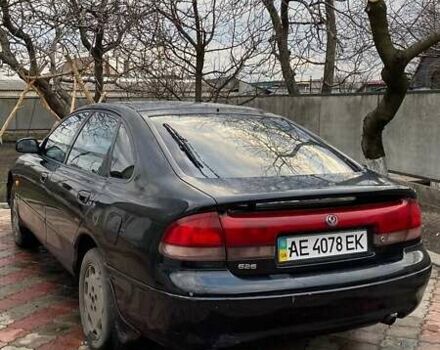 Чорний Мазда 626, об'ємом двигуна 2 л та пробігом 155 тис. км за 1500 $, фото 4 на Automoto.ua