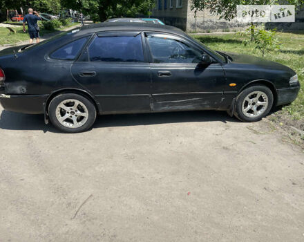 Чорний Мазда 626, об'ємом двигуна 2 л та пробігом 270 тис. км за 1900 $, фото 8 на Automoto.ua