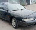 Черный Мазда 626, объемом двигателя 1.8 л и пробегом 200 тыс. км за 1800 $, фото 2 на Automoto.ua