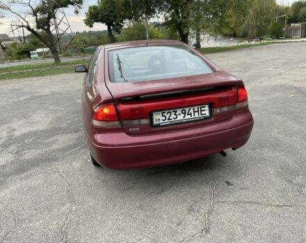 Черный Мазда 626, объемом двигателя 1.8 л и пробегом 262 тыс. км за 1300 $, фото 5 на Automoto.ua