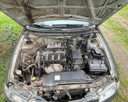 Черный Мазда 626, объемом двигателя 0 л и пробегом 330 тыс. км за 534 $, фото 1 на Automoto.ua
