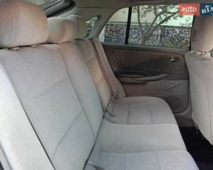 Черный Мазда 626, объемом двигателя 1.8 л и пробегом 316 тыс. км за 2700 $, фото 5 на Automoto.ua