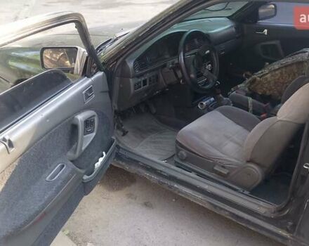 Черный Мазда 626, объемом двигателя 2.2 л и пробегом 400 тыс. км за 1200 $, фото 4 на Automoto.ua