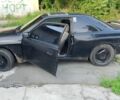 Черный Мазда 626, объемом двигателя 2 л и пробегом 100 тыс. км за 781 $, фото 1 на Automoto.ua