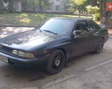 Черный Мазда 626, объемом двигателя 2.2 л и пробегом 400 тыс. км за 1200 $, фото 2 на Automoto.ua