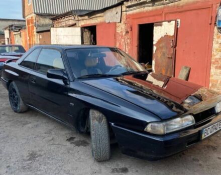 Черный Мазда 626, объемом двигателя 2.2 л и пробегом 280 тыс. км за 1900 $, фото 4 на Automoto.ua