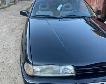 Черный Мазда 626, объемом двигателя 2.2 л и пробегом 280 тыс. км за 1900 $, фото 1 на Automoto.ua