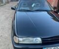 Черный Мазда 626, объемом двигателя 2.2 л и пробегом 280 тыс. км за 1900 $, фото 1 на Automoto.ua