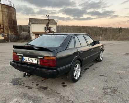 Черный Мазда 626, объемом двигателя 2 л и пробегом 420 тыс. км за 1300 $, фото 3 на Automoto.ua