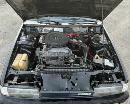 Черный Мазда 626, объемом двигателя 2 л и пробегом 420 тыс. км за 1300 $, фото 7 на Automoto.ua