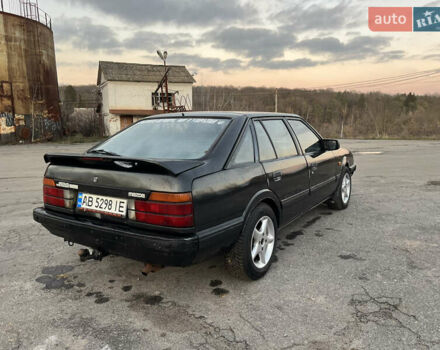 Черный Мазда 626, объемом двигателя 2 л и пробегом 420 тыс. км за 1300 $, фото 4 на Automoto.ua