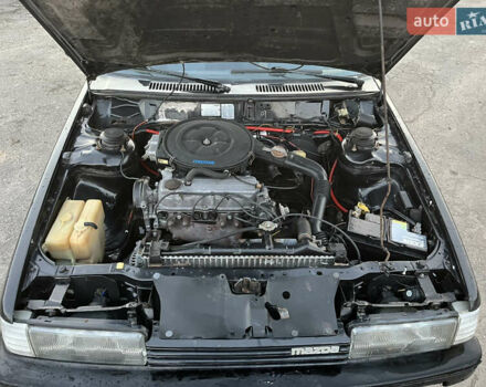 Черный Мазда 626, объемом двигателя 2 л и пробегом 420 тыс. км за 1300 $, фото 8 на Automoto.ua