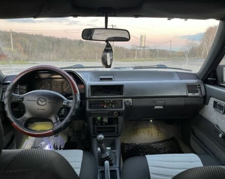 Черный Мазда 626, объемом двигателя 2 л и пробегом 420 тыс. км за 1300 $, фото 6 на Automoto.ua