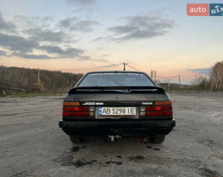 Черный Мазда 626, объемом двигателя 2 л и пробегом 420 тыс. км за 1300 $, фото 3 на Automoto.ua