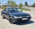 Черный Мазда 626, объемом двигателя 2 л и пробегом 300 тыс. км за 699 $, фото 1 на Automoto.ua