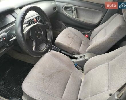 Черный Мазда 626, объемом двигателя 2 л и пробегом 410 тыс. км за 1650 $, фото 11 на Automoto.ua