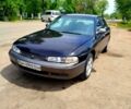 Черный Мазда 626, объемом двигателя 2 л и пробегом 89 тыс. км за 1550 $, фото 1 на Automoto.ua