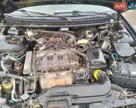 Черный Мазда 626, объемом двигателя 2 л и пробегом 410 тыс. км за 1650 $, фото 18 на Automoto.ua