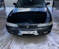 Черный Мазда 626, объемом двигателя 1.8 л и пробегом 300 тыс. км за 1025 $, фото 1 на Automoto.ua