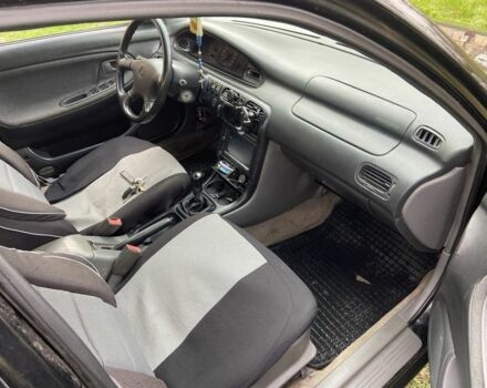 Черный Мазда 626, объемом двигателя 2 л и пробегом 300 тыс. км за 1150 $, фото 22 на Automoto.ua