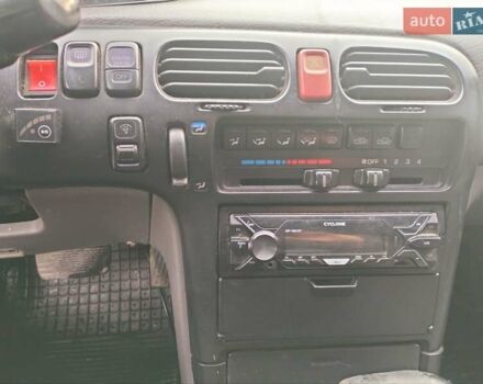 Черный Мазда 626, объемом двигателя 2 л и пробегом 410 тыс. км за 1650 $, фото 13 на Automoto.ua