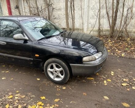 Черный Мазда 626, объемом двигателя 2 л и пробегом 300 тыс. км за 1150 $, фото 12 на Automoto.ua