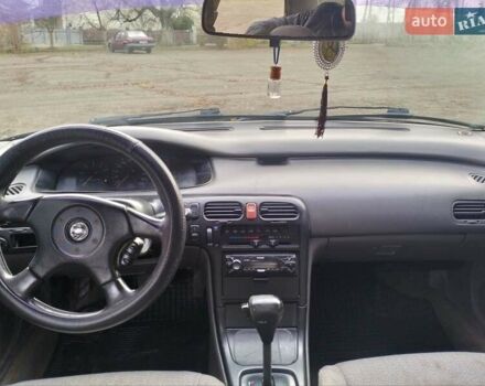 Черный Мазда 626, объемом двигателя 2 л и пробегом 410 тыс. км за 1650 $, фото 7 на Automoto.ua