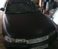 Черный Мазда 626, объемом двигателя 2 л и пробегом 10 тыс. км за 1560 $, фото 1 на Automoto.ua