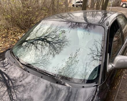 Черный Мазда 626, объемом двигателя 2 л и пробегом 300 тыс. км за 1150 $, фото 1 на Automoto.ua