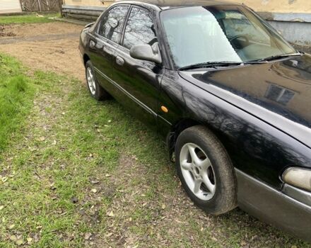 Черный Мазда 626, объемом двигателя 2 л и пробегом 300 тыс. км за 1150 $, фото 23 на Automoto.ua