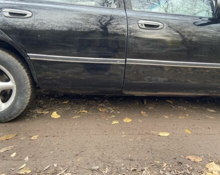 Черный Мазда 626, объемом двигателя 2 л и пробегом 300 тыс. км за 1150 $, фото 9 на Automoto.ua