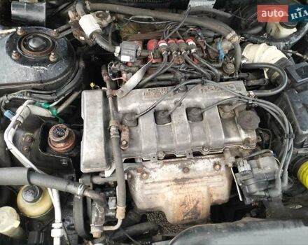 Черный Мазда 626, объемом двигателя 2 л и пробегом 410 тыс. км за 1650 $, фото 20 на Automoto.ua