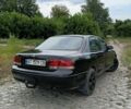 Черный Мазда 626, объемом двигателя 1.8 л и пробегом 172 тыс. км за 1201 $, фото 1 на Automoto.ua