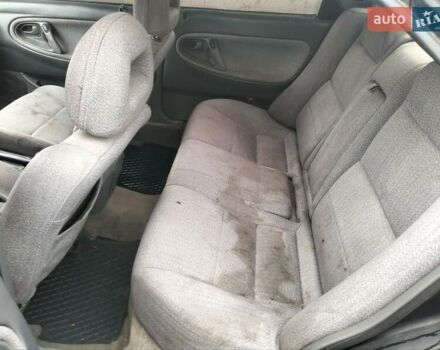 Черный Мазда 626, объемом двигателя 2 л и пробегом 410 тыс. км за 1650 $, фото 10 на Automoto.ua