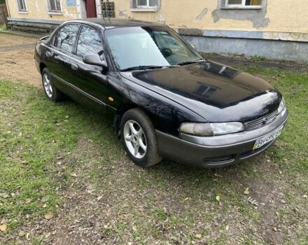 Черный Мазда 626, объемом двигателя 2 л и пробегом 300 тыс. км за 1150 $, фото 19 на Automoto.ua