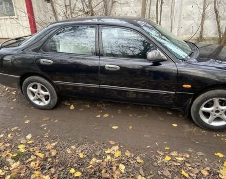 Черный Мазда 626, объемом двигателя 2 л и пробегом 300 тыс. км за 1150 $, фото 10 на Automoto.ua