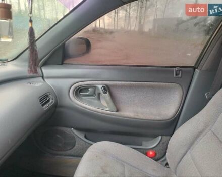 Черный Мазда 626, объемом двигателя 2 л и пробегом 410 тыс. км за 1650 $, фото 12 на Automoto.ua