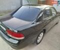 Черный Мазда 626, объемом двигателя 2 л и пробегом 423 тыс. км за 1500 $, фото 1 на Automoto.ua
