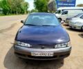 Черный Мазда 626, объемом двигателя 2 л и пробегом 89 тыс. км за 1550 $, фото 1 на Automoto.ua