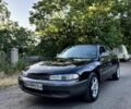 Черный Мазда 626, объемом двигателя 2 л и пробегом 80 тыс. км за 1150 $, фото 1 на Automoto.ua